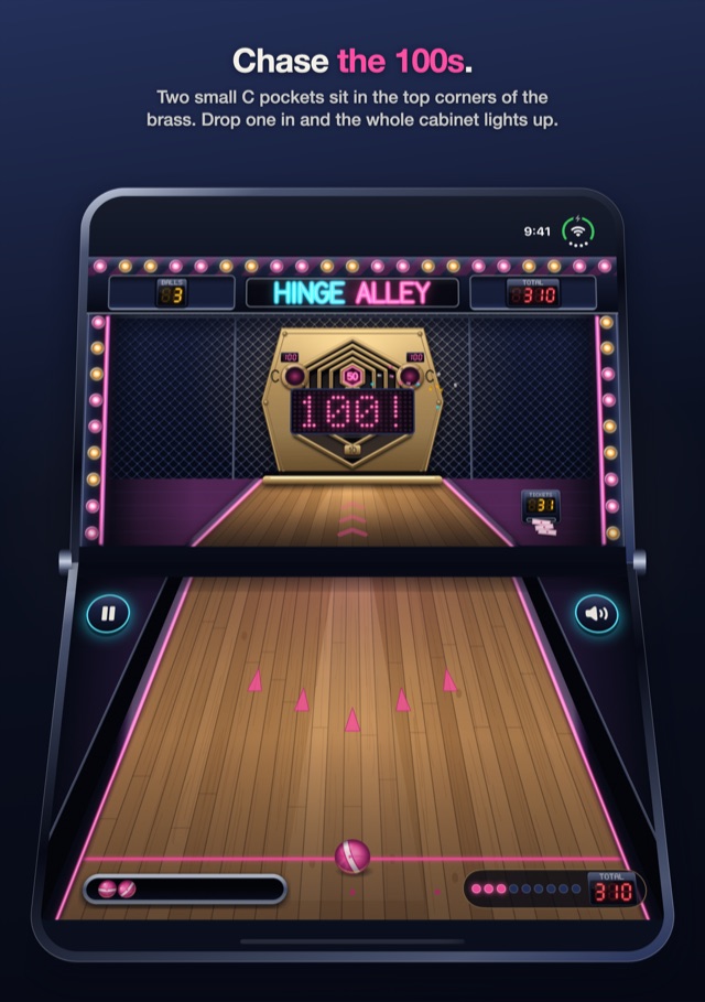A phone folded like a laptop, the arcade cabinet standing on the raised half and the maple lane on the half below. A ball has just dropped into the right corner pocket, 100! is lit across the brass plate and the bulbs chase pink.